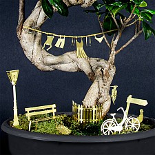 Miniature per decorare i vasi da fiori. Giro in bicicletta