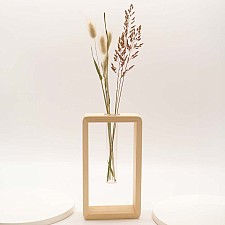 Vaso minimalista in legno con tubo da laboratorio