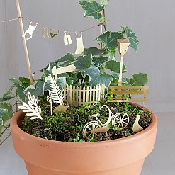 Miniature per decorare i vasi da fiori. Giro in bicicletta