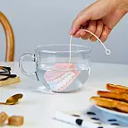 Infusore per tè a forma di dente