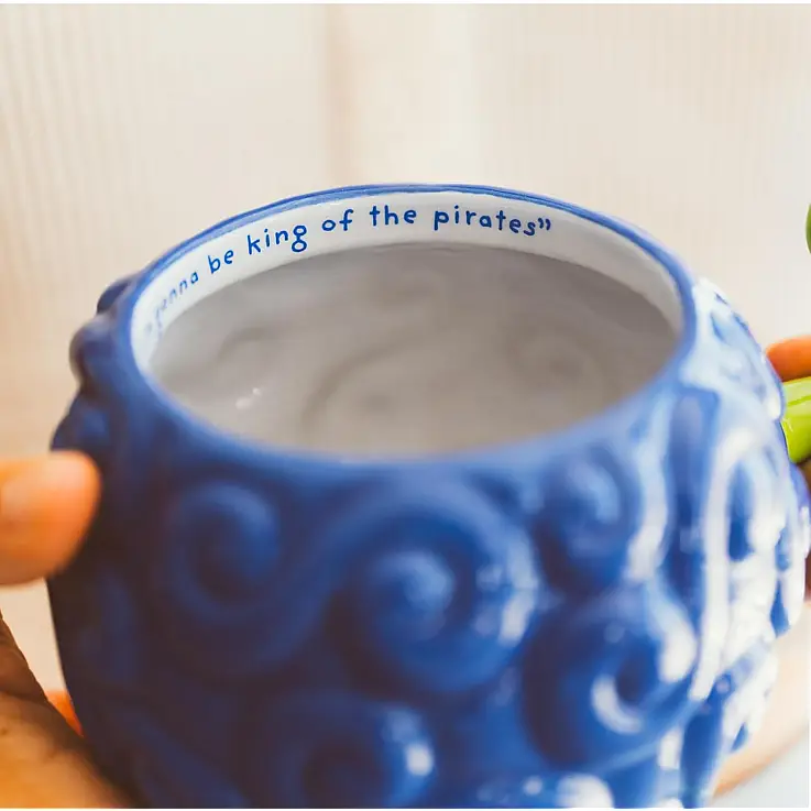 Include la frase "Sarò il re dei pirati".