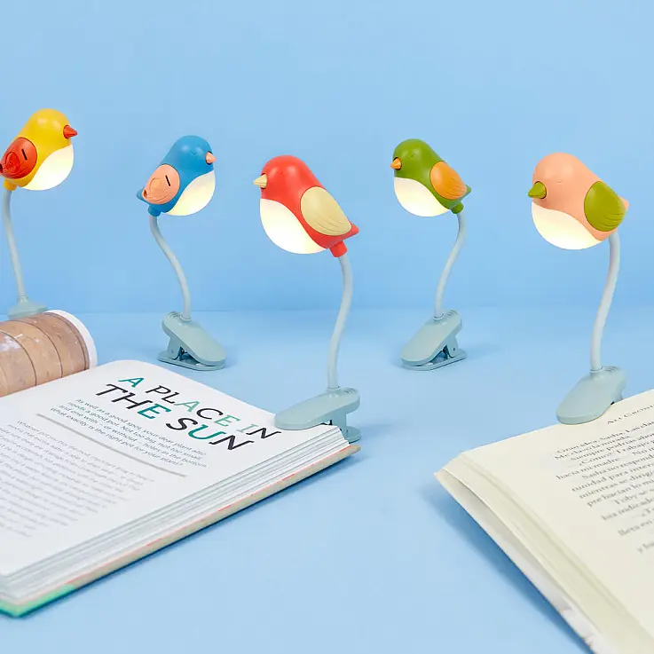 Luce da lettura a forma di uccello